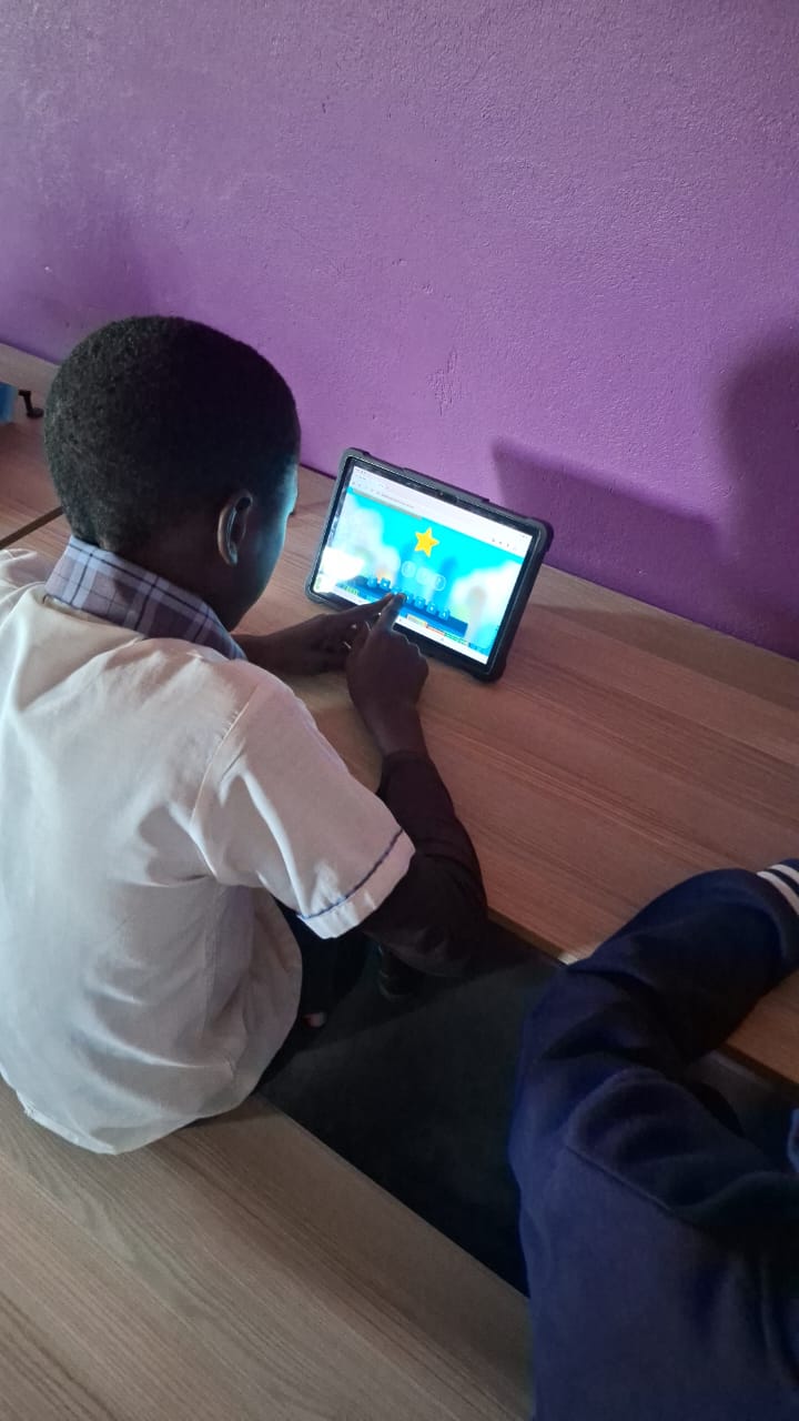 A child works through a learning game on Kula Kids at Alliance Française - Lusaka